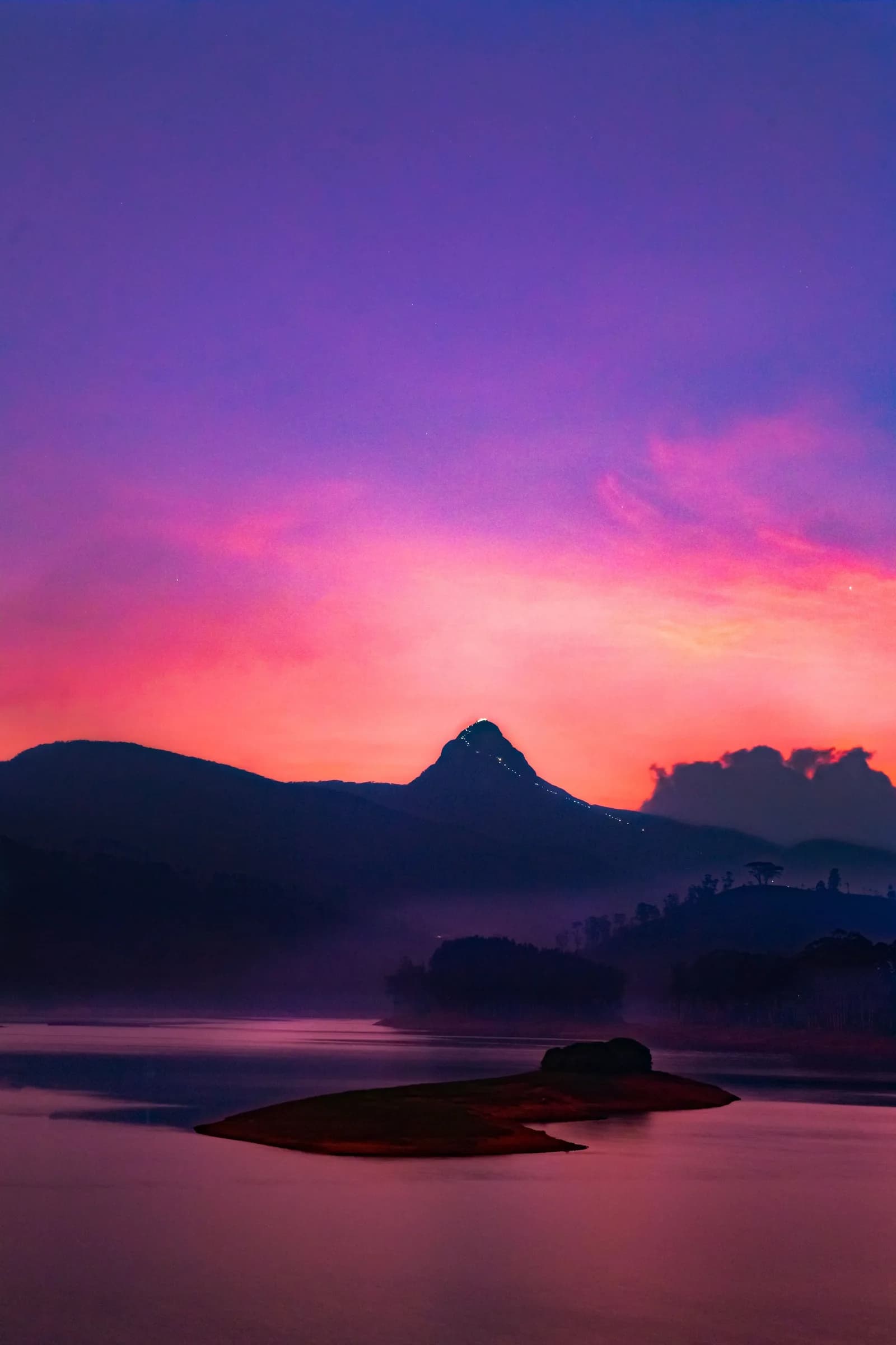 Sacred Adam's Peak mountain trail amidst Sri Lanka's majestic highland mist.