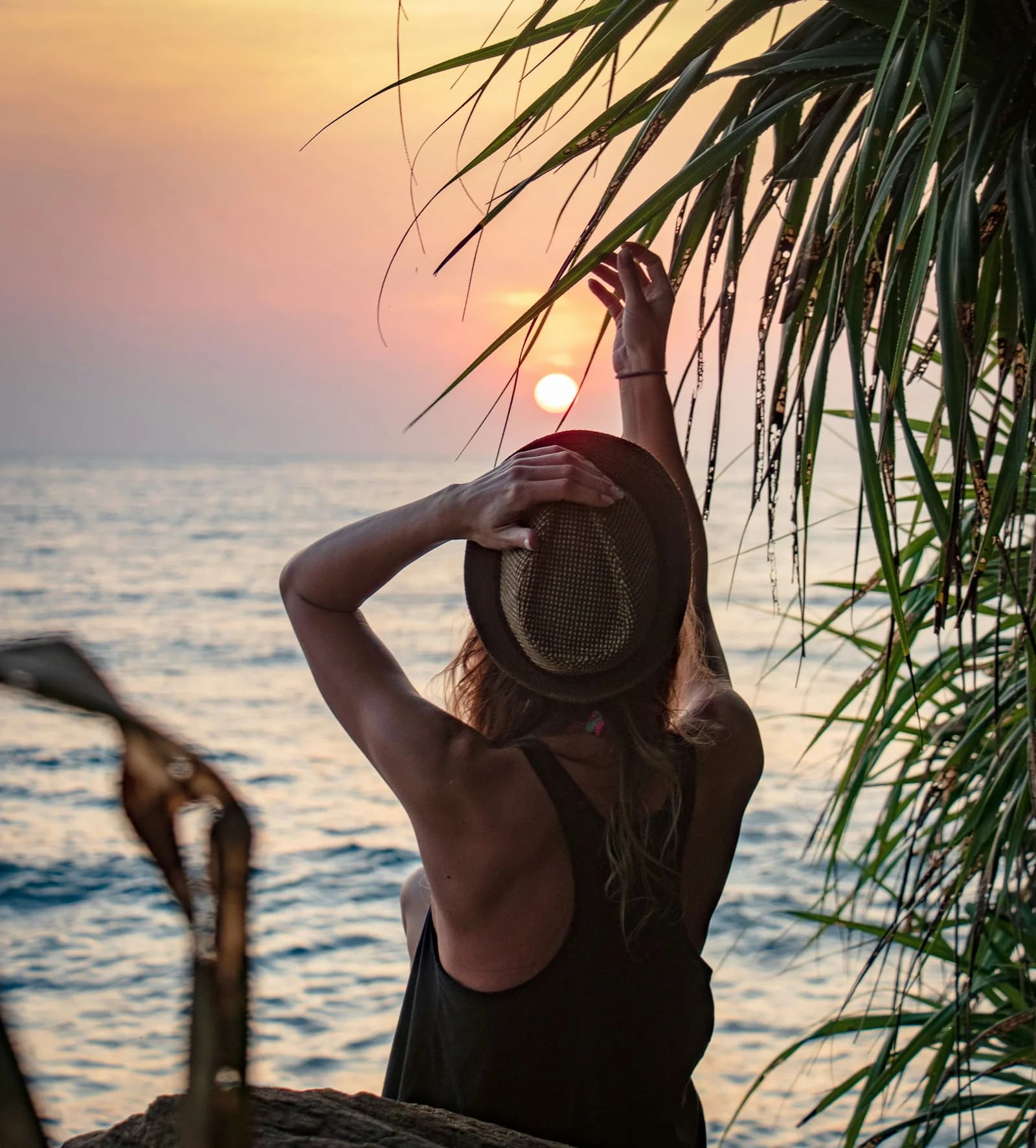 Spectacular golden sunset glowing over pristine Sri Lanka coast.